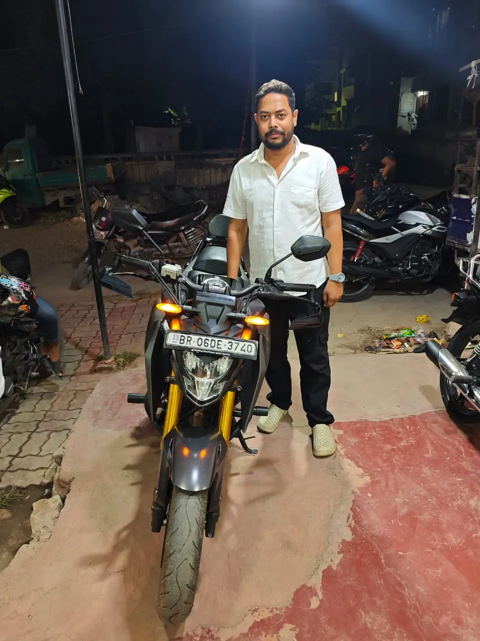 Customer riding home on second hand bike bought near Bihar Junction